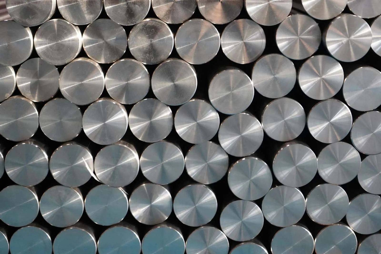 Cut ends of titanium round bar stacked in a bundle