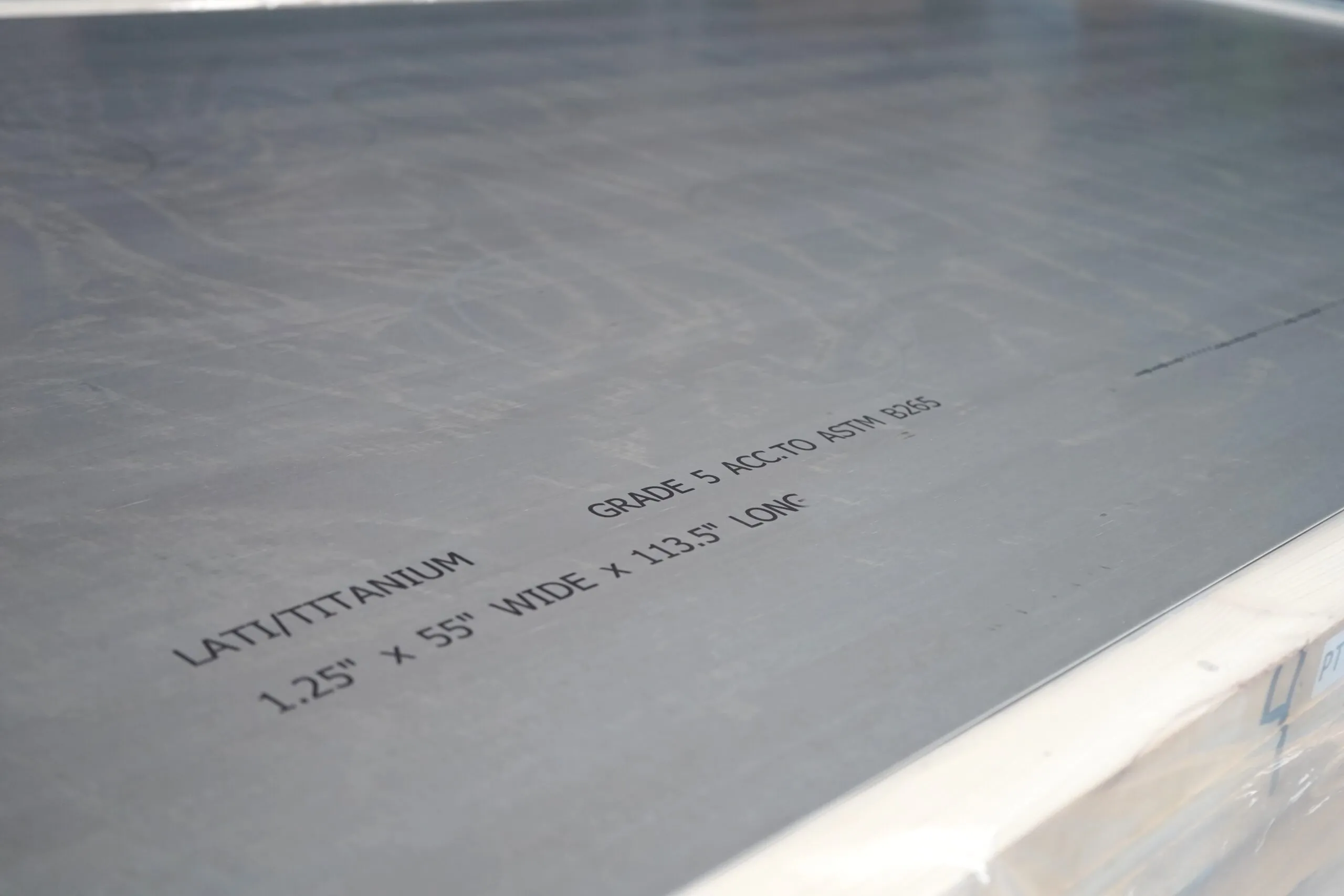 Grade 5 titanium plate stenciled "Grade 5 acc. to ASTM B265", 1.25 in thick