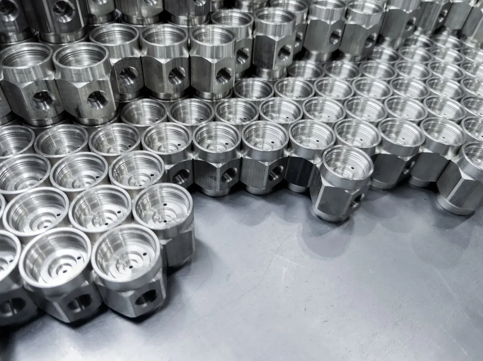 Rows of machined fittings and couplings